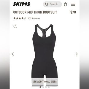 Skims Outdoor Mid Thigh Body Suit in Soot color